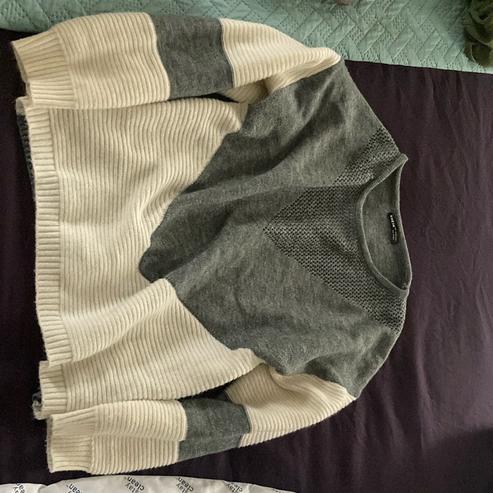 Gray and white sweater